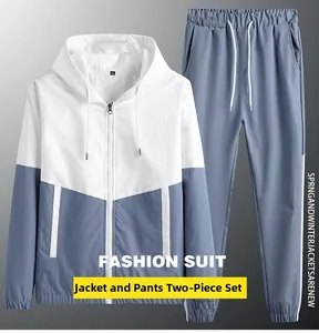 Ensemble de sport deux pièces avec veste à capuche et pantalon assorti en bleu et blanc