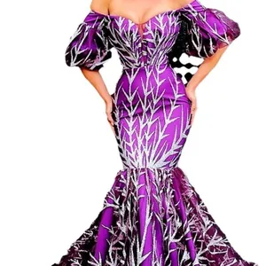 Elegant purple mermaid gown featuring silver branch sequins and off-the-shoulder sleeves