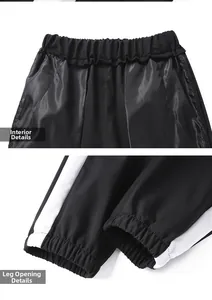 Vue détaillée de la doublure de la taille et des chevilles nervurées du jogging noir