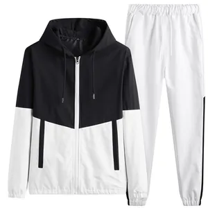 Survêtement bicolore noir et blanc pour homme avec veste à capuche et pantalon de sport