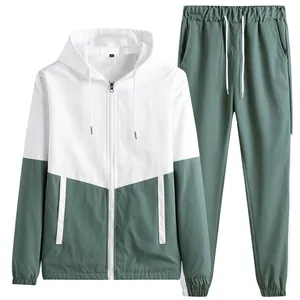 Ensemble de survêtement bicolore pour hommes avec veste à capuche blanche et jogging vert
