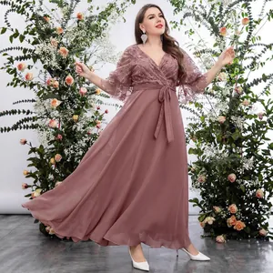 Elegant plus size V-neck evening gown with embroidered mesh sleeves and chiffon skirt.