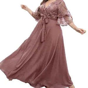 Plus size V-neck evening gown with embroidered mesh sleeves and chiffon maxi skirt.