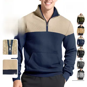 Detail of a color-block men's quarter-zip polo shirt with a textured knit fabric