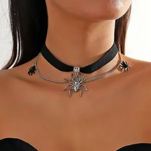 Close-up of gothic velvet spider choker necklace with silver chain and rhinestones