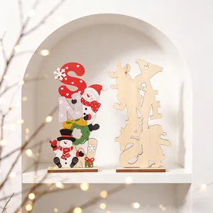 Detailed view of wooden Christmas ornaments with festive Snowman and XMAS letter cutouts.