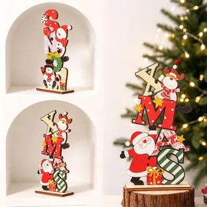 Cartoon wooden Christmas XMAS and SNOW table ornaments featuring Santa and reindeer.