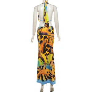 Back view of vibrant abstract print halter top and long skirt set for summer fashion