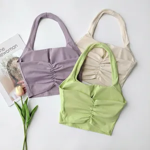 Stylish halter neck sports bra with ruched front and removable pads in three colors