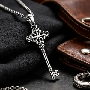 Macro close-up of a vintage stainless steel key pendant with intricate star patterns