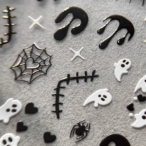 Halloween nail stickers with 3D embossed white ghosts and black spider webs icons