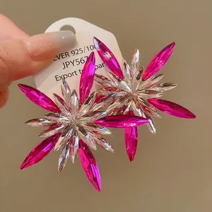 Elegant vintage fuchsia and clear crystal starburst earrings with silver needles for women