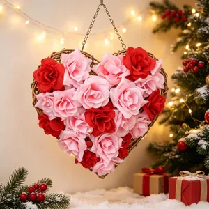 Heart-shaped wall hanging wreath with red and pink artificial roses for Valentine decor
