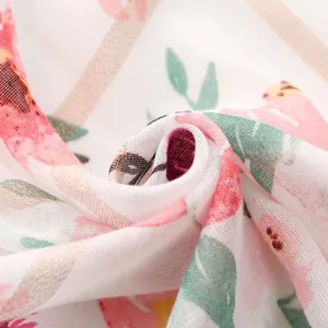 Macro detail of floral cotton linen fabric with elegant silver silk thread
