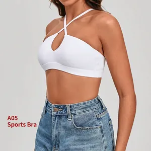 Soutien-gorge de sport blanc à licou croisé pour le yoga et le fitness de performance