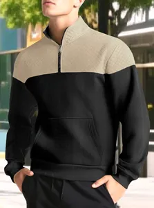 Men's color block half-zip sweatshirt with quilted texture and kangaroo pocket detail