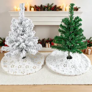 White faux fur Christmas tree skirts with gold and silver star patterns for festive decor