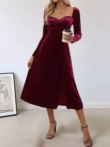 Elegant burgundy velvet midi dress featuring a square neckline and stylish side slit