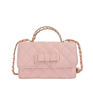 Elegante borsa a mano trapuntata rosa con fiocco e tracolla a catena dorata da donna moda