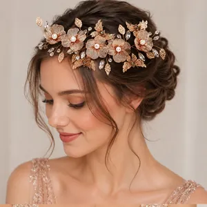 Detailed view of a vintage rose gold bridal hairband featuring elegant pearls and crystals