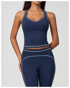 Débardeur de yoga bleu marine à dos nageur avec liseré contrasté blanc élégant et soigné