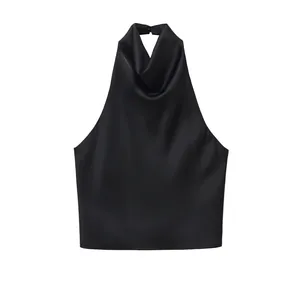 Detailed view of an elegant black satin halter neck top showing the cowl neckline and fabric.
