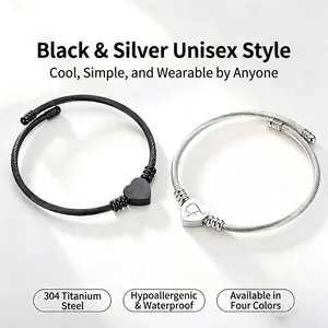 304 titanium steel cable bracelet featuring heart letter charms and waterproof design.