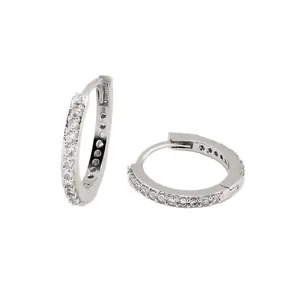 Elegant silver-tone huggie hoop earrings featuring micro-pave cubic zirconia accents