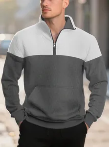 Détail d'un sweat-shirt pour homme avec maille gaufrée, motif losange et quart de zip.