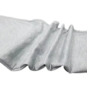 Close-up of grey slim fit athletic sweatpants fabric showing texture and folds