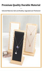 Bamboo jewelry display stand with black and beige padded panels for necklace showcase