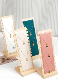 Durable bamboo necklace display stands with colored velvet backings for jewelry