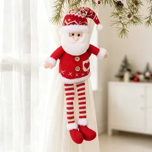Detailed shot of a knitted Santa Claus doll used as a Christmas curtain tieback