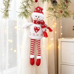 Detailed view of a knitted snowman curtain tieback for festive Christmas home decor