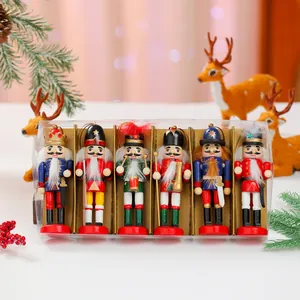 Detailed view of a 6-piece wooden nutcracker soldier ornament set in festive packaging