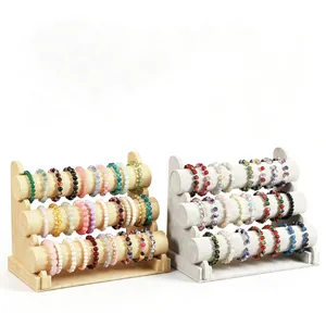Professioneller dreistufiger Schmuckständer aus Flanell und Sackleinen für Armbänder