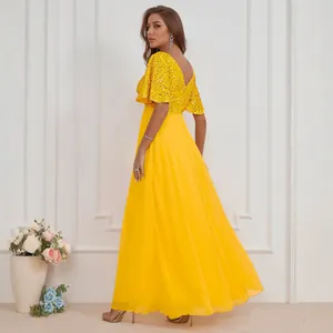 Élégante robe de soirée jaune à col en V avec corsage à paillettes et jupe en mousseline fluide