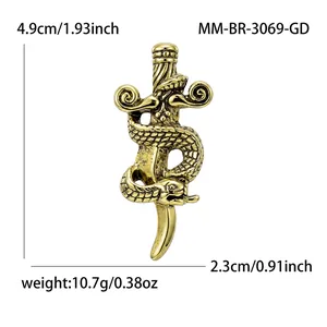 Detail view of a vintage gold alloy snake and sword brooch including size and weight specs