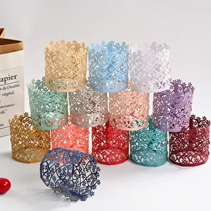 Detailed view of assorted hollow floral paper candle wraps in many colors for LED lights