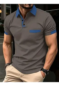 Detail view of a premium men's gray polo shirt with blue contrast collar and pocket.