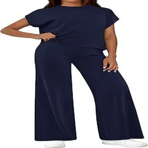 Close-up of navy blue loose two-piece set featuring short sleeve top and wide leg pants