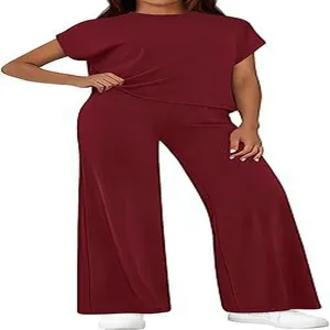 Two-piece maroon lounge set featuring short-sleeve top and high-waist wide-leg pants.