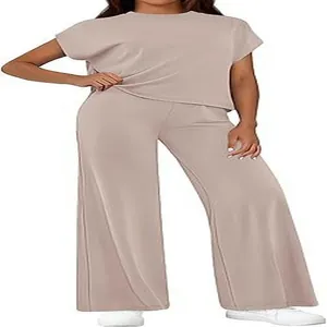 Chic taupe two-piece lounge set featuring a short sleeve top and relaxed wide leg pants