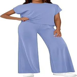 Detailed view of women's casual short sleeve top and wide leg pants set in light blue