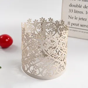 Detail view of the intricate laser-cut floral and heart pattern on the paper lampshade