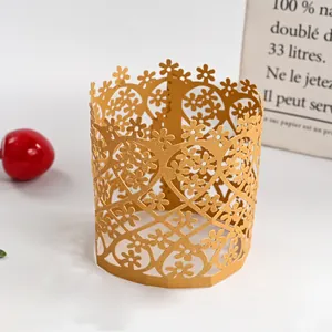 Detailed view of the intricate floral hollow pattern on the gold paper lampshade