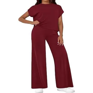 Casual two-piece set for women featuring short sleeve top and wide leg pants in burgundy.