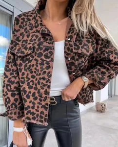Detail of a stylish oversized leopard print denim jacket with a frayed hem for women