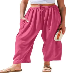Detail showing texture of fuchsia wide-leg linen pants with elastic drawstring waist