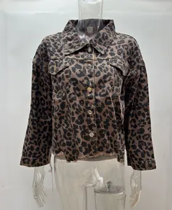 Close-up of a stylish street fashion leopard print cropped denim jacket on a mannequin